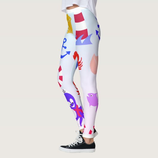 海のビーチと海獣の海洋模様 レギンス (左)