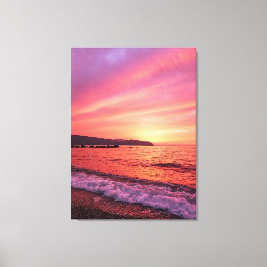海の上のピンクとオレンジの空の美しい夕日 キャンバスプリント (正面)