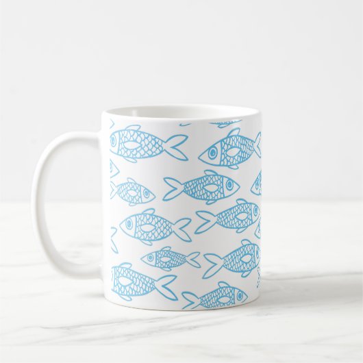 海を泳ぐ青い魚 コーヒーマグカップ (左)