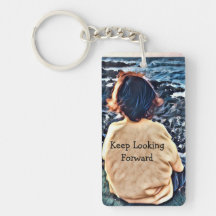 海を男の子の着席に見ること