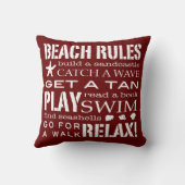 海岸のはっきりしたな赤くのによるビーチの規則及び白い クッション (裏面)