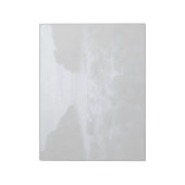 海岸沿いの小石と海 ノートパッド (回転)