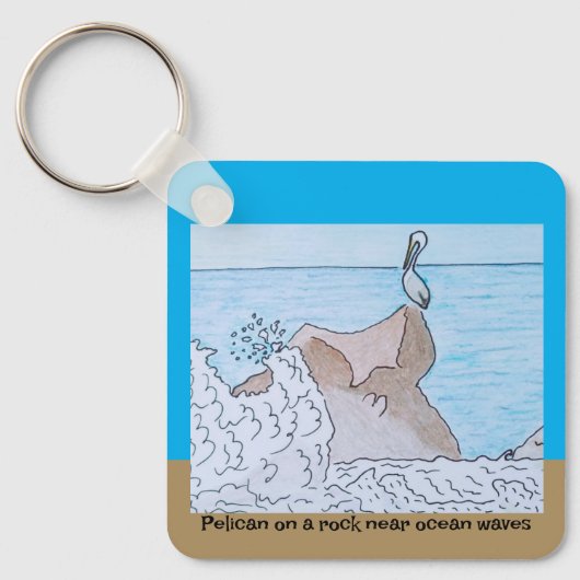 海波の近くの岩にペリカン キーホルダー (正面)
