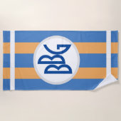海洋の青及びマリーゴールドの広いストライブ柄のモノグラム ビーチタオル (正面)