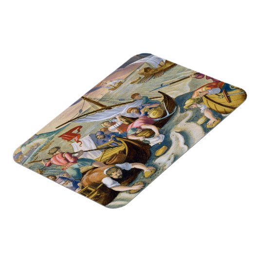 海綿を使ってナフサを表面から取り除く マグネット (左側)