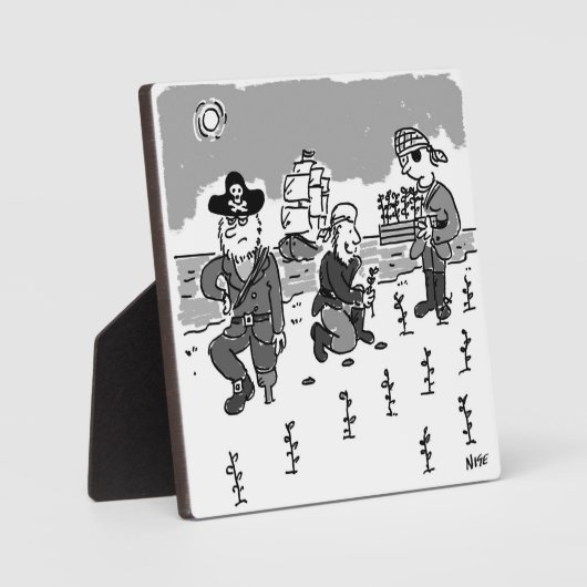 海賊は木製の脚を使ってガーデニングしている。おもしろい フォトプラーク (正面)