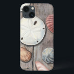 海辺の宝物 iPhone 13ケース<br><div class="desc">ミーガン・メイガーは彼女のアート作品シンプルで知られている。この写真は、砂金や貝殻など、海の宝物のシンプルさをパステル色のトーンで捉えている。メイガーは、これらの宝物をコントラストするために彼女のイメージの木製の背景を含む。今日の素晴らしZazzle製品の木製の色でこのアートプリントを取得。</div>