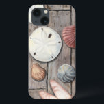 海辺の宝物 iPhone 13ケース<br><div class="desc">ミーガン・メイガーは彼女のアート作品シンプルで知られている。この写真は、砂金や貝殻など、海の宝物のシンプルさをパステル色のトーンで捉えている。メイガーは、これらの宝物をコントラストするために彼女のイメージの木製の背景を含む。今日の素晴らしZazzle製品の木製の色でこのアートプリントを取得。</div>