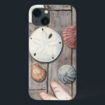 海辺の宝物 iPhone 13ケース<br><div class="desc">ミーガン・メイガーは彼女のアート作品シンプルで知られている。この写真は、砂金や貝殻など、海の宝物のシンプルさをパステル色のトーンで捉えている。メイガーは、これらの宝物をコントラストするために彼女のイメージの木製の背景を含む。今日の素晴らしZazzle製品の木製の色でこのアートプリントを取得。</div>