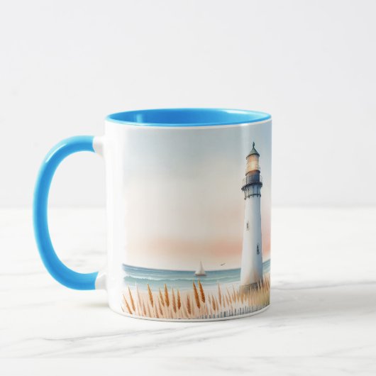 海辺の灯台とコテージの水彩画シーン マグカップ (左)