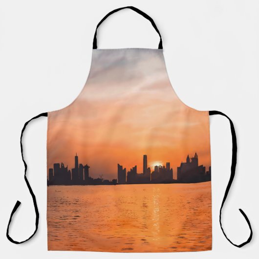 海辺の町の夕日 – 水色 エプロン (正面)