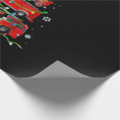 消防士トラッククリスマスツリーの男性女性 ラッピングペーパー (角)