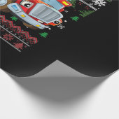 消防車の消防士クリスマスかわいい男の子サンタハット ラッピングペーパー (角)