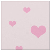 淡いピンクに散らばったピンクのハート ファブリック (クローズアップ)