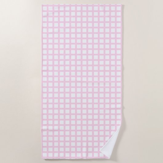 淡いピンクの白い四角形のグリッドパターン ビーチタオル (正面)