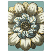 淡いブルーの背景の華美な花の円形浮彫り クリップボード (裏面)