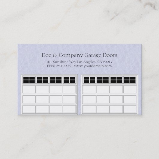 淡いブルーのGarage Door Company 名刺 (正面)