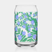 淡い紫のフローラの花と緑の葉植物 ガラス缶 (左)