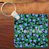 淡い紫のフローラの花と緑の葉植物 キーホルダー (正面)