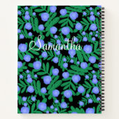淡い紫のフローラの花と緑の葉植物 ノートブック (裏面)