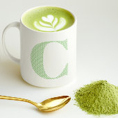 淡い緑と白の水玉模様のモノグラム コーヒーマグカップ