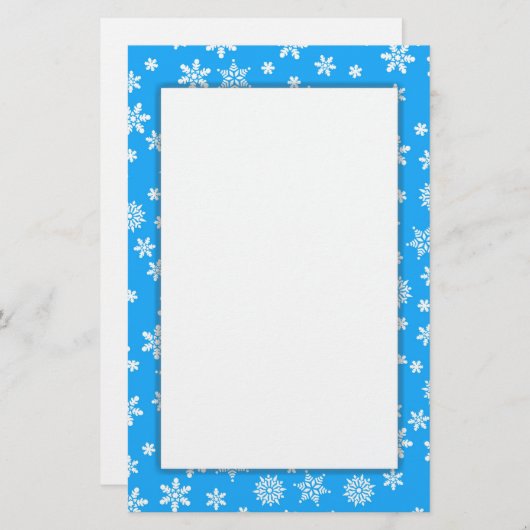 淡い青の背景に白い雪の結晶 便箋 (正面/裏面)