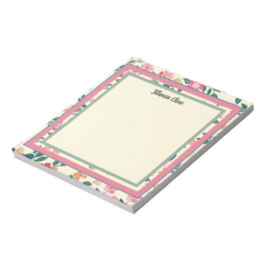 淡い黄色の背景を持つ花枠 ノートパッド (回転)