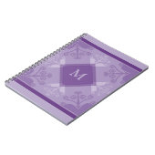 渦巻は紫色のモノグラムの螺線形ノートを模造します ノートブック (左側)