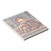 温かい暖炉のそばで眠るアイリッシュセッターの子犬 ノートパッド (アングル)