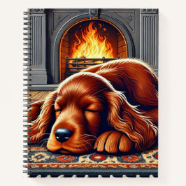 温かい暖炉のそばで眠るアイリッシュセッターの子犬 ノートブック