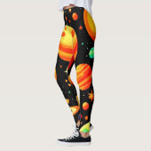 温かい色調の宇宙マンガアート レギンス (左)