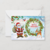 「温かい願い:クリスマスカードがあふれ出る ノートカード (正面)