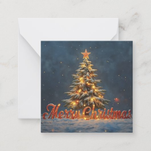 温かなライトに照らされた雪のクリスマスツリー ノートカード (正面)