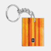 温風化オレンジ赤いモノグラム キーホルダー (正面左)