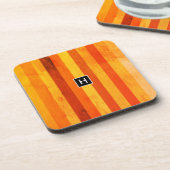 温風化オレンジ赤いモノグラム コースター (左側)