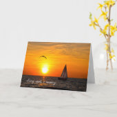 湖の上での帆船と夕焼け（お悔やみ申し上げます） カード (黄色い花)