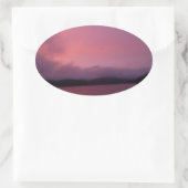 湖の矢印に紫の夕日 楕円形シール (バッグ)