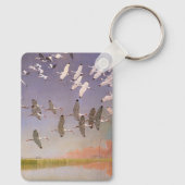 湿地に飛んでいるイビスの群れヴィンテージ キーホルダー (裏面)