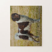 湿地の犬のジグサウ。 ジグソーパズル (縦)