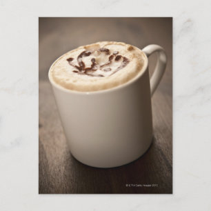 溶かしたカプチーノコーヒーのマグカップ ポストカード