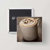 溶かしたカプチーノコーヒーのマグカップ 缶バッジ (正面&裏面)