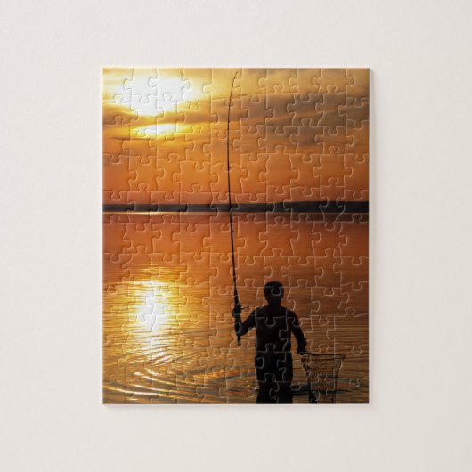 漁師は回転によって魚をつかまえます ジグソーパズル (縦)