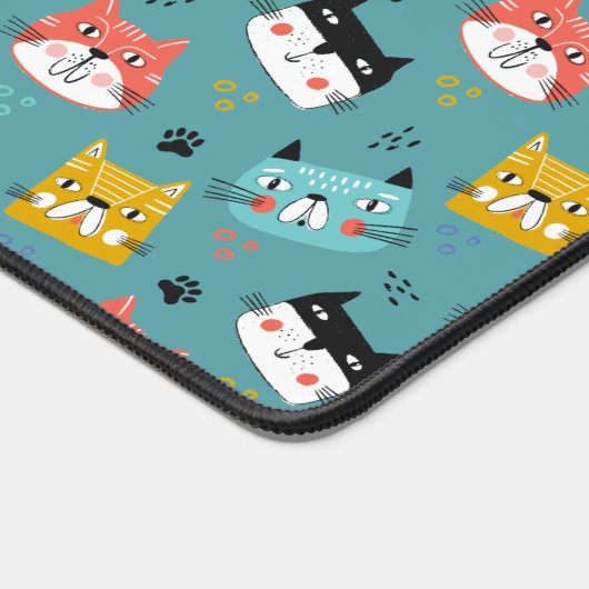 漫画カラフル猫顔オンティール(緑がかった色) デスクマット (コーナー)