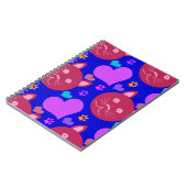 漫画スタイルのシームレスな壁紙と猫の顔 ノートブック (左側)