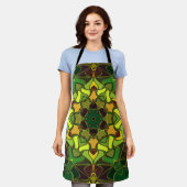 漫画マンダラフラワーグリーン黄色とオレンジ エプロン (着用した状態)