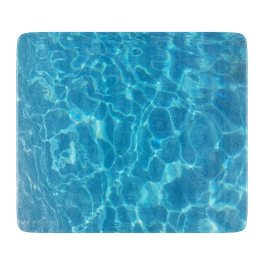 澄んだ青空の青いプールの水 カッティングボード (正面)