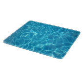 澄んだ青空の青いプールの水 カッティングボード (角)