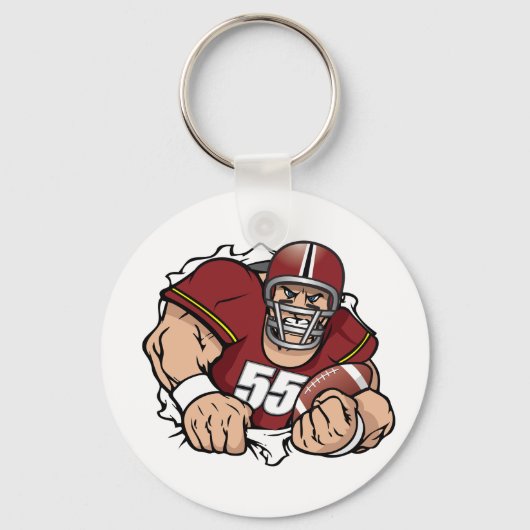 激しいアメリカンフットボール選手が突破 キーホルダー (正面)