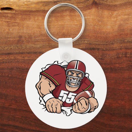 激しいアメリカンフットボール選手が突破 キーホルダー