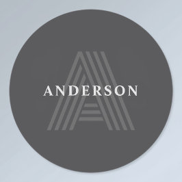 濃い灰色のレトロモダンモノグラムの名 ラベル